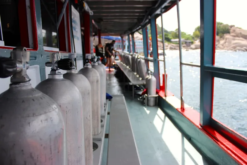 scuba tanks in the racks on the dive platform