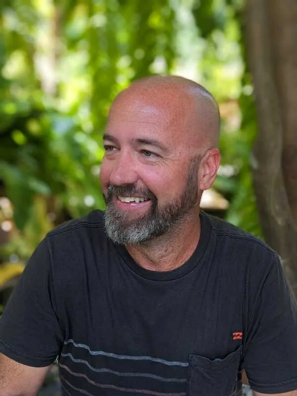 will north owner of ocean sound koh tao having a morning coffee
